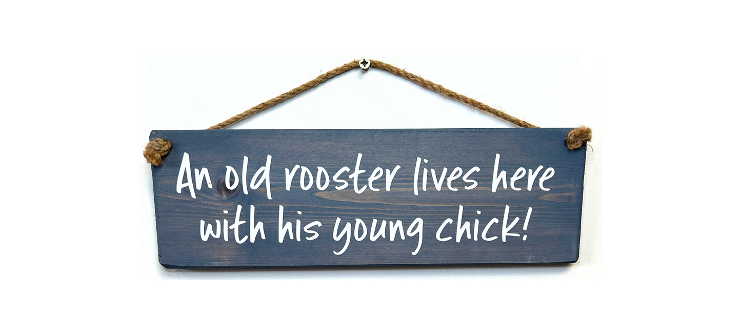 An old Rooster and hie young chick live here