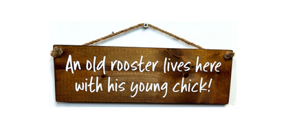 An old Rooster and hie young chick live here