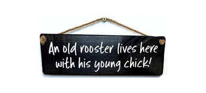 An old Rooster and hie young chick live here